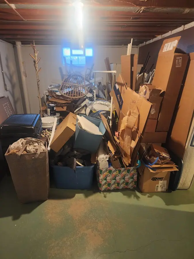 Roll-off dumpster container at job site for Construction Dumpster Rental in Medford